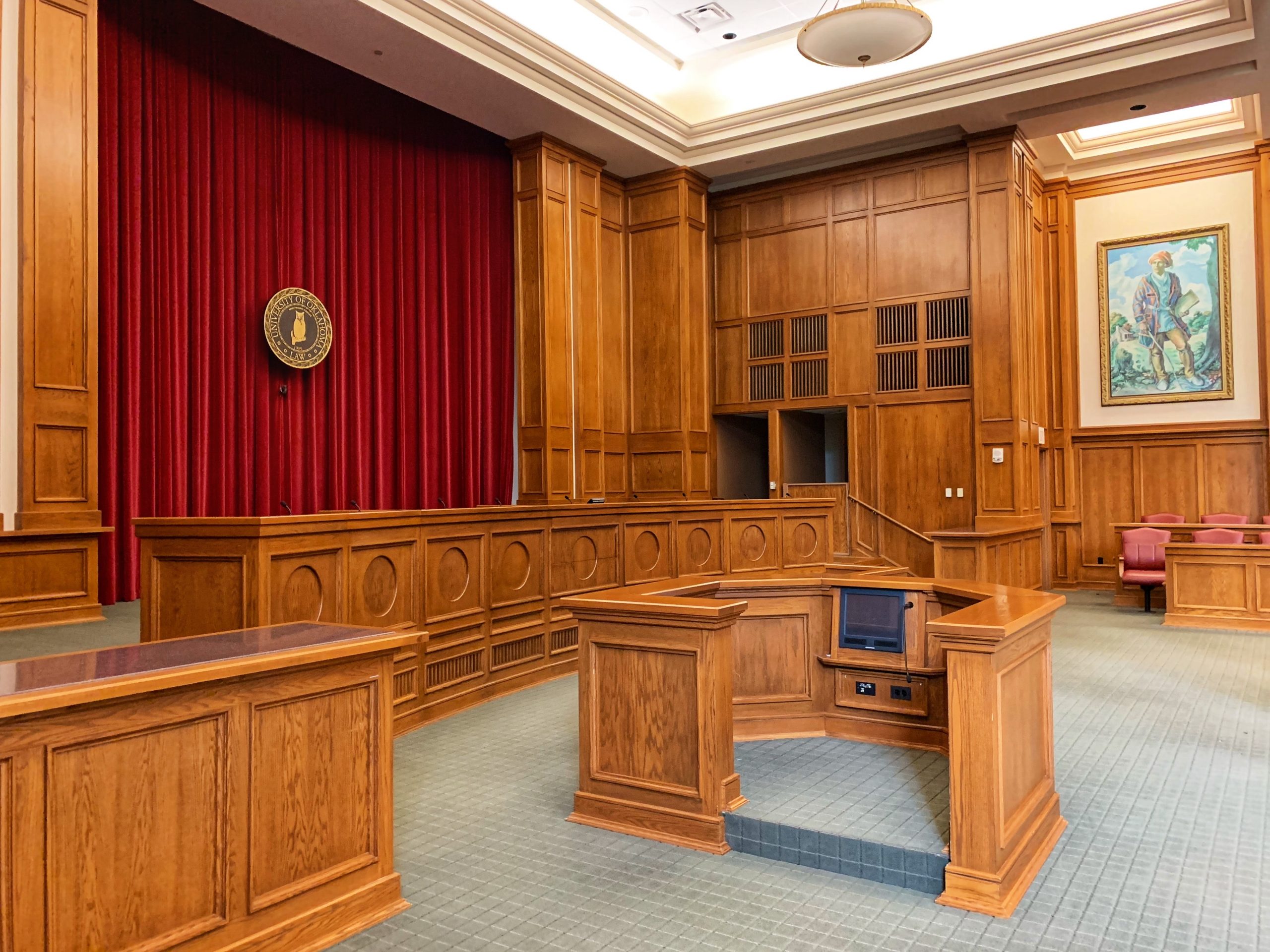 Both go to a courtroom that looks like this, but civil and criminal cases are different.